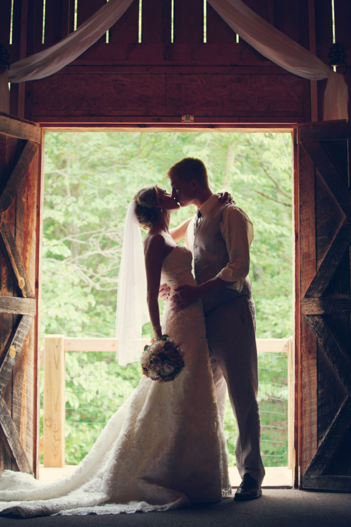 rustic barn wedding couple